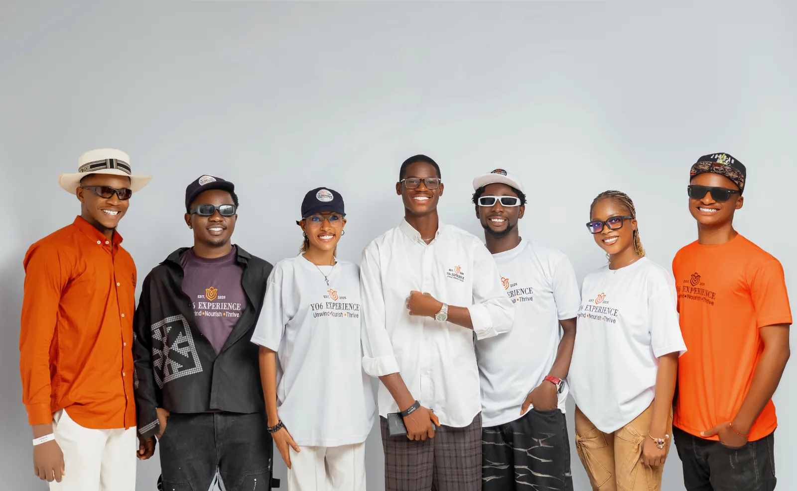 The Y06 Experience team, wearing branded shirts